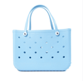 A light blue EVA waterproof beach tote bag with a solid pattern and ventilation holes.