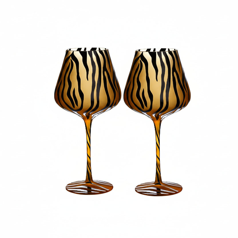 Two tiger-striped wine glasses with a white box labeled 'Handmade Crystal Glass' on a white background.