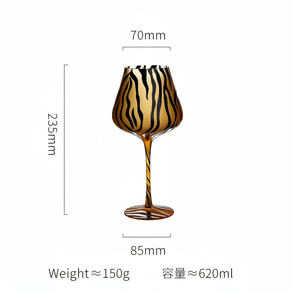 Wine glass with tiger stripe pattern and measurements on a white background