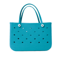 A large turquoise EVA waterproof beach tote bag with a solid pattern and holes on the front.