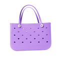 A lilac-colored extra large EVA beach tote bag with a solid pattern and holes across the surface.