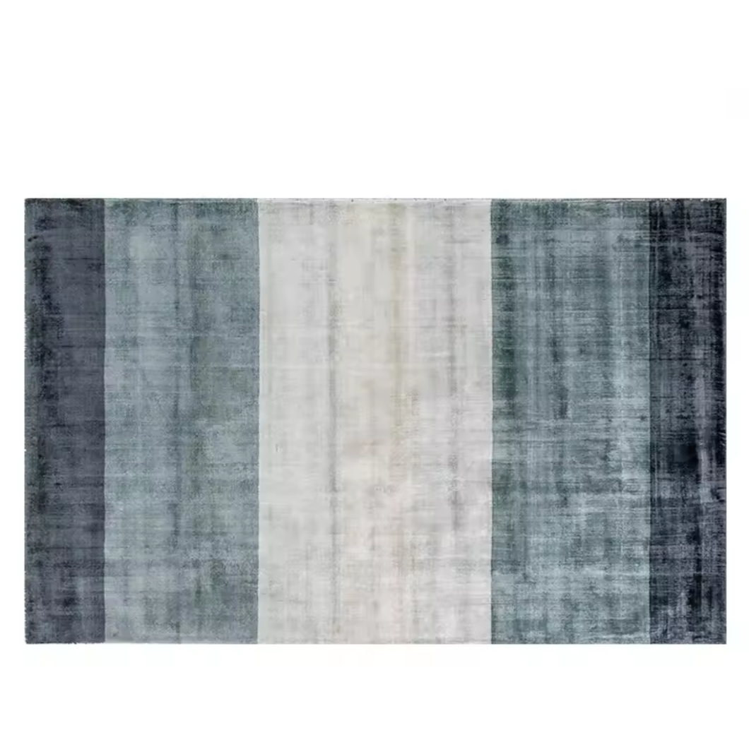 Textured striped blue ombre gradient indoor rug  on white background 