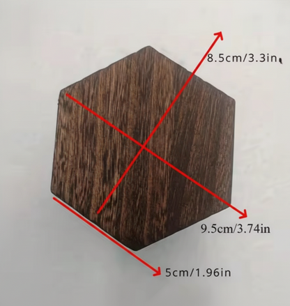 Wooden hexagonal block with measurements on a gray background