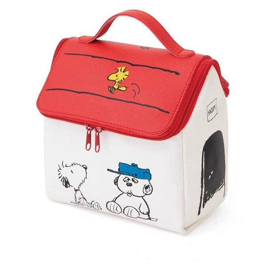 A Snoopy House Peanuts makeup toiletries travel bag with a white base color and red details, featuring character illustrations from the Peanuts comic.